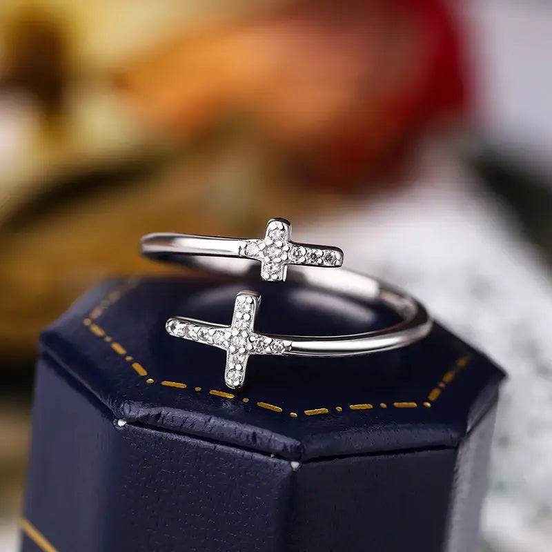 Double Christian cross ring with diamonds on blue box