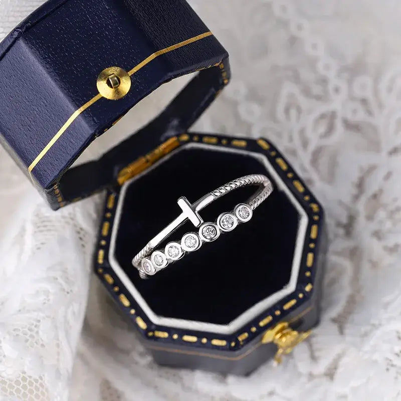 Double-layer Christian cross ring with diamonds on blue box