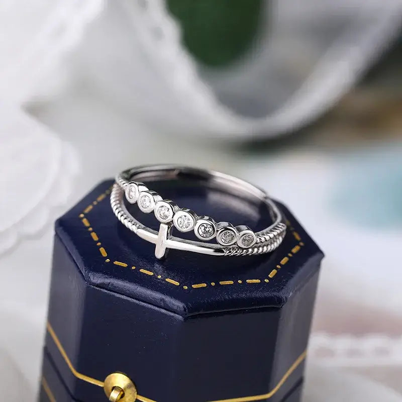 Double-layer Christian cross ring with diamonds on blue box