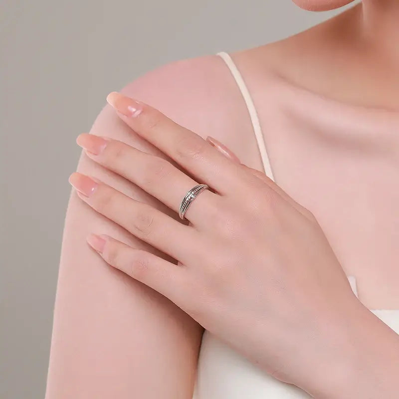 Silver Ring with diamond cross on woman