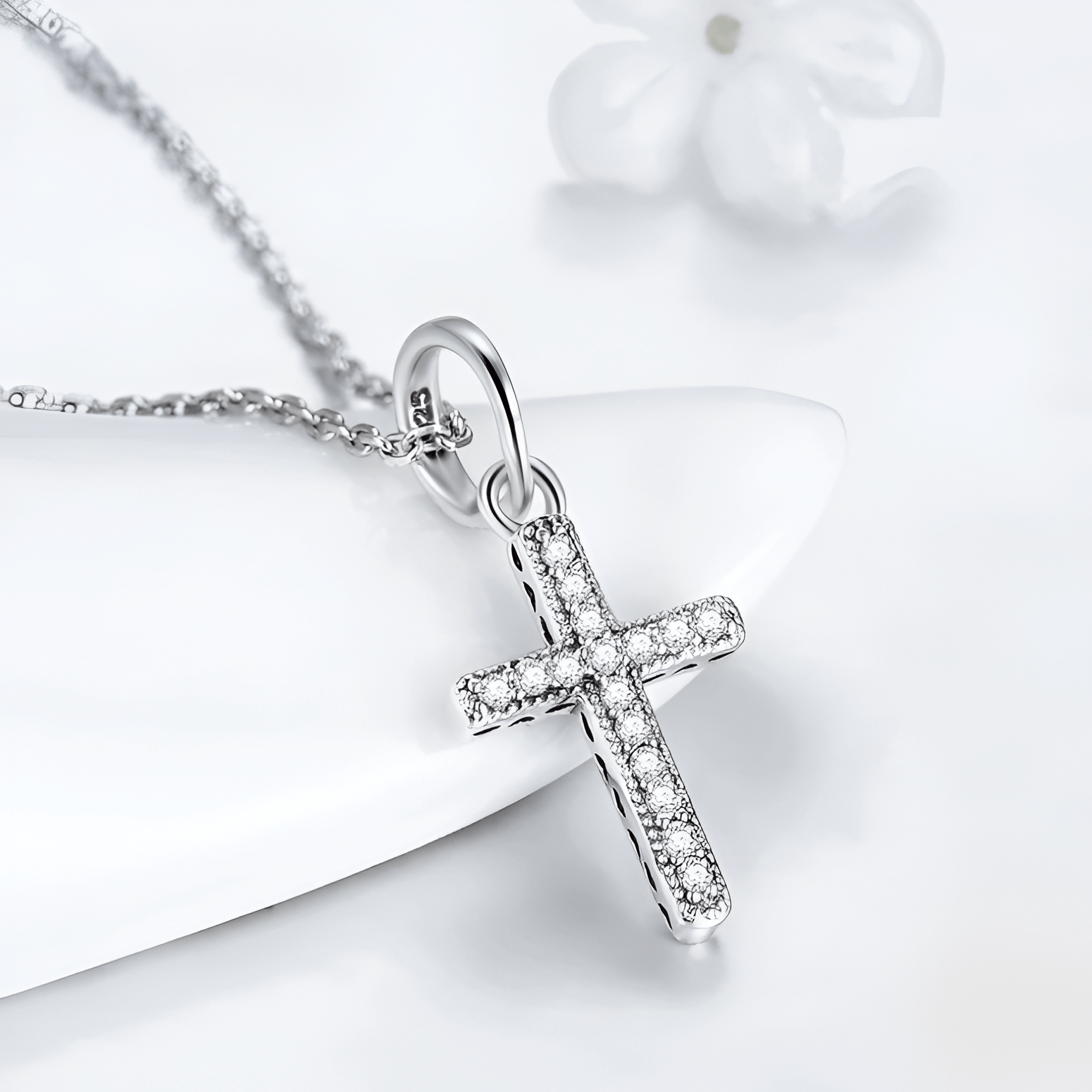 Silver cross pendant necklace with diamonds