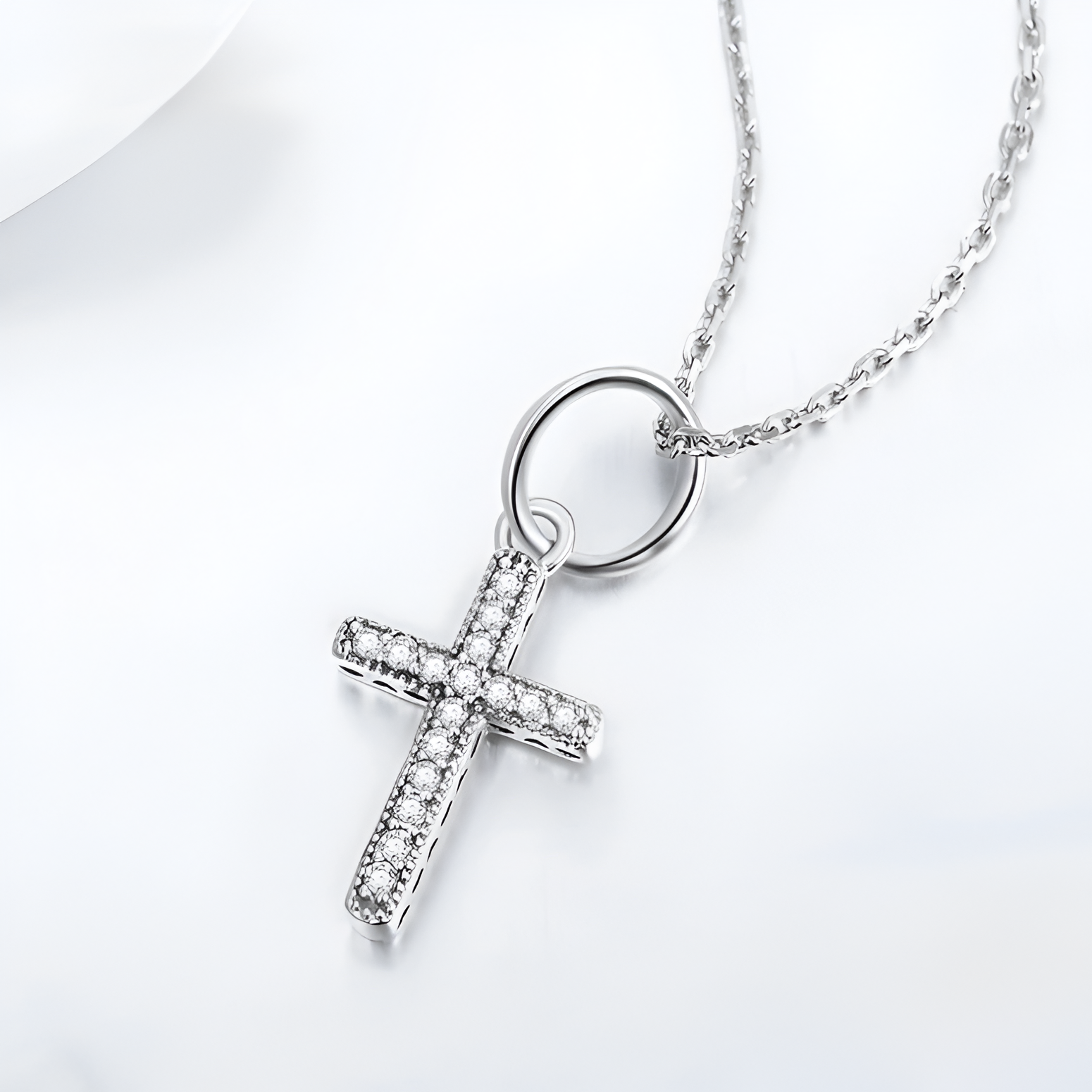 Silver cross pendant necklace with diamonds