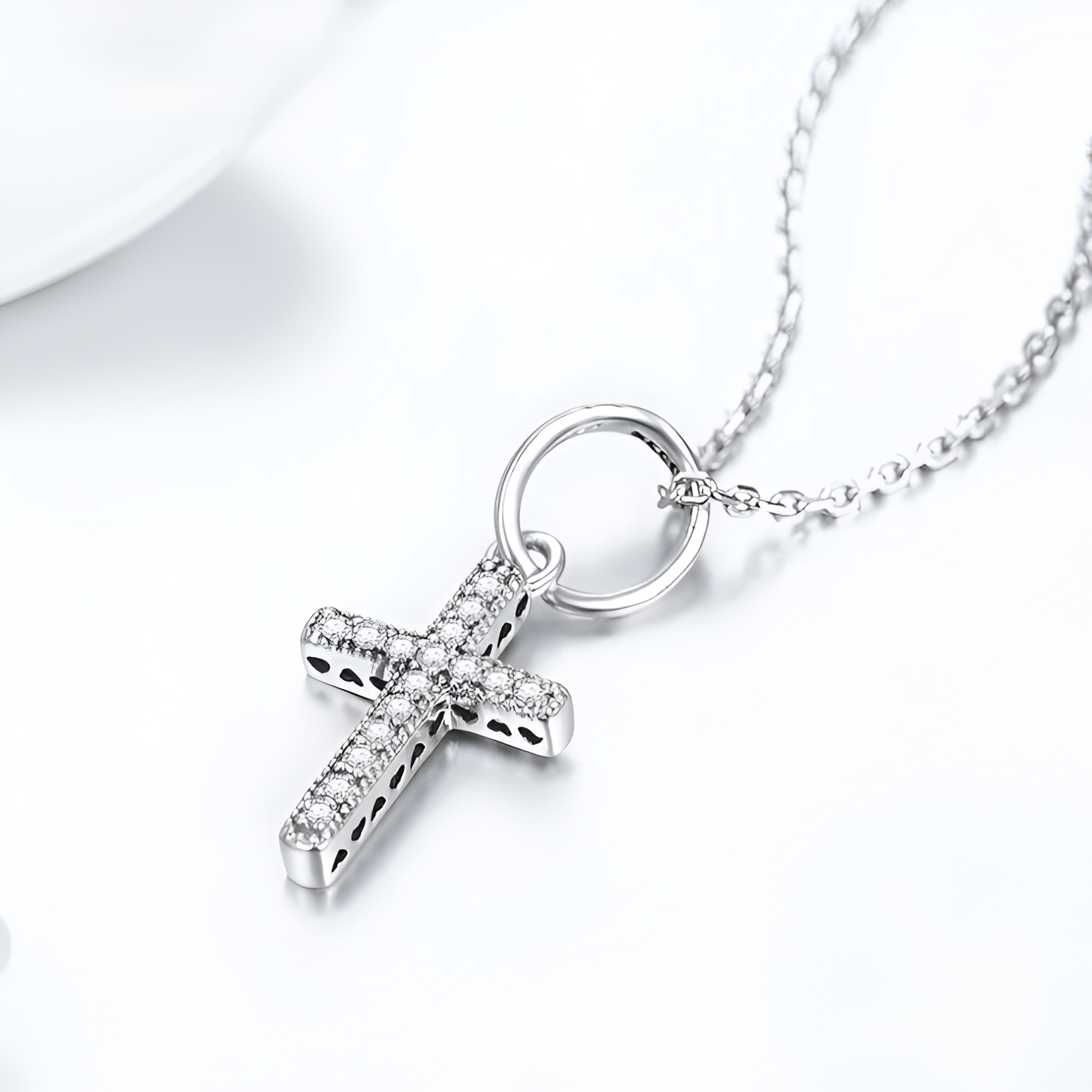 Silver cross pendant necklace with diamonds